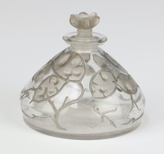 A Lalique Lunaria circular tapered glass scent bottle with moulded leaf decoration, the base etched lower case R Lalique France 124, 8cm d