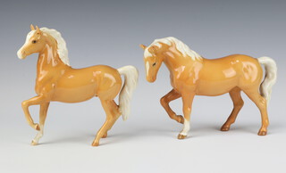 A Beswick figure of Prancing Arab Type No 1261 Palomino gloss by Arthur Gredington 17cm and a ditto right leg raised tail attached to back left leg 14cm 