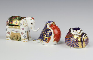 Three Royal Crown Derby Imari pattern paperweights - rodent with gold stopper base marked LIV 7cm, robin gold stopper LIII 6.5cm and an Infant Indian elephant gold stopper MMVI 7cm