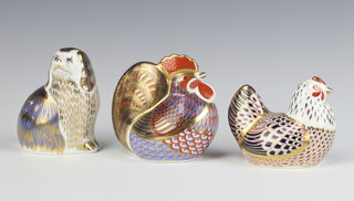 Three Royal Crown Derby Imari pattern paperweights - chicken LV (no stopper) 6cm, cockerel LVI 9cm and seated Spaniel LVI 10cm (all are seconds)  