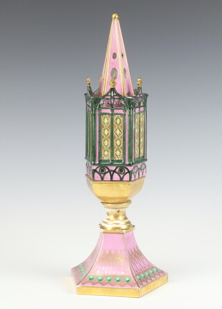 A Victorian porcelain pastel burner in the form of a tower raised on a shaped spreading foot 14cm 