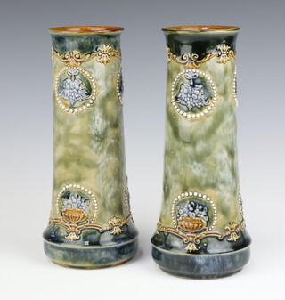 A pair of Royal Doulton green salt glazed cylindrical vases, bases impressed Royal Doulton 6699, incised CA 25cm 