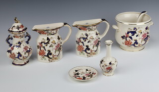 A pair of Masons Mandalay pattern wall pockets in the form of jugs 16cm, a twin handled chassepot 15cm, a ladle, twin handed lidded urn and cover 20cm, ditto specimen vase 14cm and a circular dish 12cm  