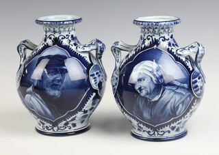 A pair of 19th/20th Century Delft twin handled vases decorated fisherfolk, the base marked Delft B.2130 with impressed mark 18cm 