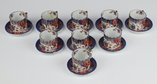 Nine Chinese miniature porcelain coffee cans and saucers with figural decoration, the bases with 6 character mark 