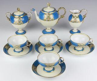 An 11 piece Noritake blue and gilt decorated coffee service comprising coffee pot, twin handled sugar bowl, cream jug, 4 coffee cups, 4 saucers (1 with blemish to gilt banding)