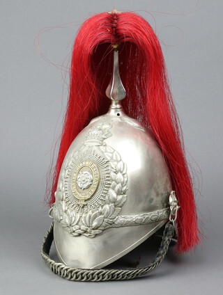 A Victorian Other Ranks Yorkshire Dragoon Guards Albert Pattern helmet complete with plume and chin strap 