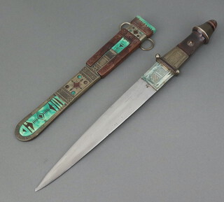 An Eastern double bladed dagger with 26cm blade, horn grip and leather scabbard with metal mounts 