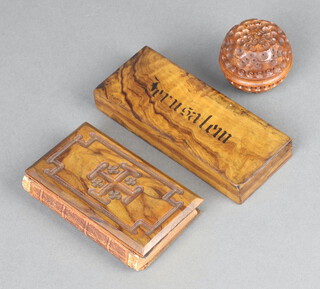 A rectangular olive wood 4 division stamp box, the lid marked Jerusalem 2cm x 12cm x 5cm (missing a section to the side of the lid), a book of Common Prayer printed by The Oxford University Press with carved olive wood cover (a/f) and a carved walnut jar and cover 4cm 