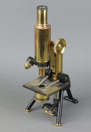 A 19th Century gilt metal single pillar microscope, the base marked W11655 