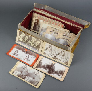 Approximately 50 19th Century Excelsior stereoscopic Tours slides, contained in a card box with cloth upholstery, varied subjects from landscapes, flowers, children, domestic scenes etc  