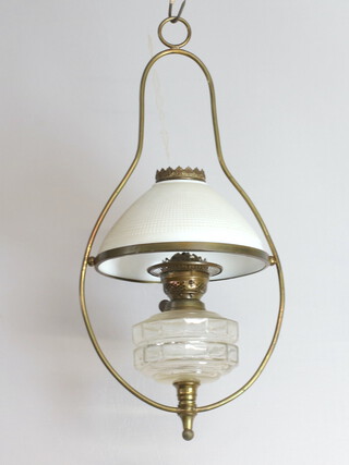 A glass and gilt metal hanging oil lamp with opaque glass shade 59cm h x 30cm 
