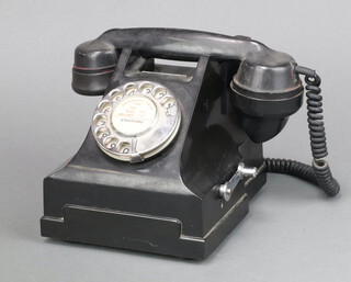 A black Bakelite internal telephone, base marked N1049H35T 
