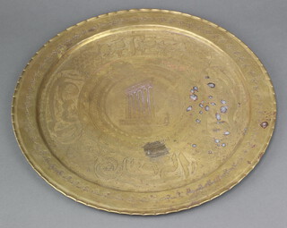 An Eastern brass charger engraved a building 42cm 