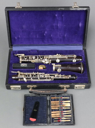 Howarth & Co, an oboe cased, complete with various accessories 