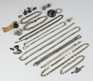 A silver flat link bracelet and minor silver jewellery including necklaces, bracelets, brooches etc 180 grams 