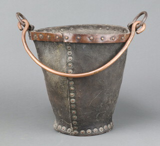 An 18th/19th Century leather cavalry feed/fire bucket with copper swing handle 27cm x 28cm 