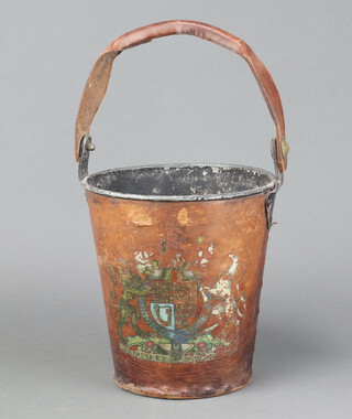 A 19th Century  metal and leather covered fire bucket with Royal arms and leather swing handle 24cm x 23cm 