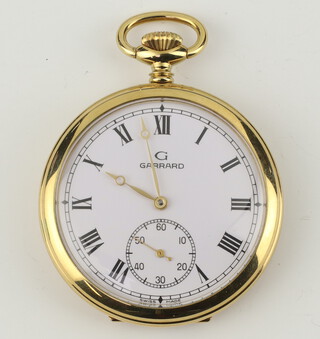 A Garrards gilt cased pocket watch with seconds at 6 o'clock and engraved presentation inscription 50mm 