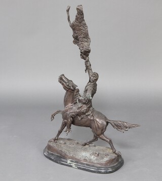 After Frederic Remington, a bronze figure "Buffalo Sling" 93cm h x 51cm w x 27cm d 
