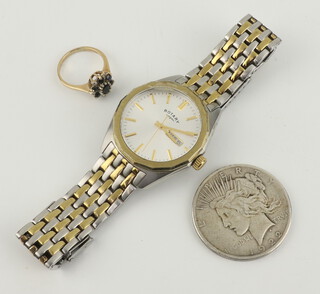 A 9ct yellow gold paste set ring 3.3 grams, size M, a Rotary calendar wristwatch and a 1922 dollar 