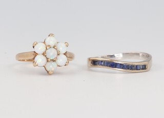 A 9ct yellow gold opal cluster ring, size H and a white metal sapphire half eternity ring size K 1/2, 4 grams 