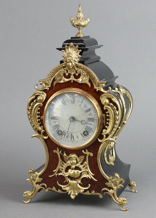 Lenzkrich, a 20th Century French 8 day striking mantel clock with 9cm silvered dial, Roman numerals, the back plate marked One Million 34881, complete with pendulum but no key, contained in an ebonised and walnut shaped case 31cm h x 18cm w x 11cm d 