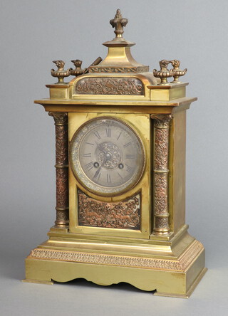 A 19th Century  French 8 day striking mantel clock, the 9cm silvered dial with Roman numerals marked Maple & Company, the back plate marked A*B contained in an ornate gilt case with finials supported by columns 40cm h x 24cm w x 13cm d, complete with pendulum and key