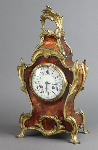 A 19th/20th Century French 8 day mantel clock with 10cm enamelled dial, Roman numerals, contained in a walnut finished and gilt ormolu mounted case, the back plate marked with an Ace of Spades numbered 90085 complete with pendulum and key, 40cm h x 20cm w x 13cm d 