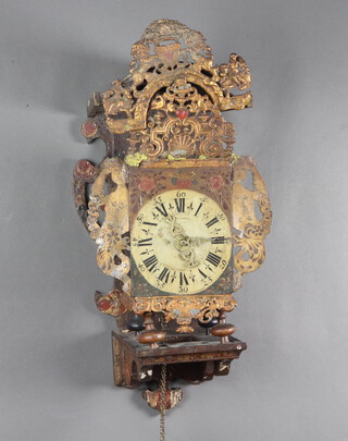 An 18th/19th Century Continental striking alarm wall clock contained in a metal and cast lead case 59cm h x 31cm w x 20cm d, complete with pendulum and weight 