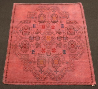 A red and black ground Afghan rug with geometric designs 196cm x 163cm 