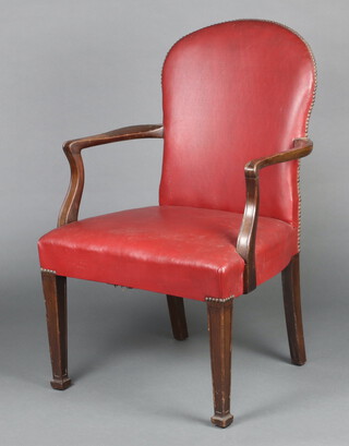 A 19th Century  style mahogany library chair the back and seat upholstered in red material, on square tapered supports, spade feet 92cm h x 58cm w x 51cm d (seat 29cm x 33cm) 