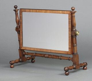 A 19th Century  rectangular plate dressing table mirror contained in a mahogany swing frame 45cm h x 53cm w x 26cm d 