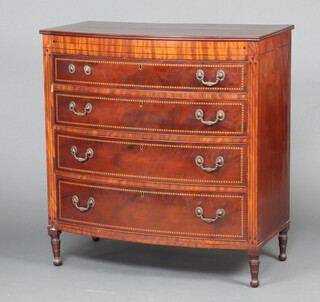A 19th Century  inlaid mahogany bow front chest of 4 long graduated drawers with gilt metal swan neck drop handles raised on turned supports 105cm h x 99cm w x 53cm d 