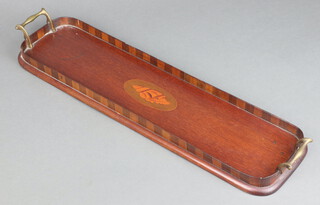 An Edwardian oval inlaid mahogany twin handled bottle tray, the centre inlaid a shell 4cm x 58cm x 15cm 