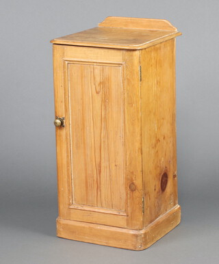 A Victorian pine pot cupboard with raised back, fitted a shelf enclosed by panelled door, on a platform base 78cm h x 36cm w x 36cm d 