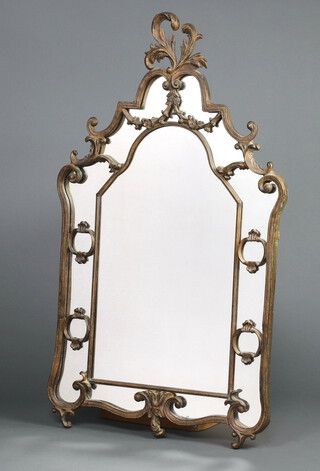 An Italian style arched plate mirror contained in a painted gilt frame 112cm h x 74cm w  