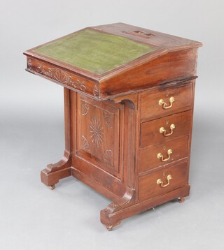 A Victorian mahogany Davenport with green inset writing surface, the pedestal fitted 4 drawers 76cm h x 56cm w x 55cm d 