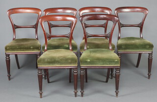 James Winter 101 Wardour Street, a set of 6 mahogany spoon back dining chairs with carved mid rails and overstuffed seats, raised on turned and reeded supports 90cm h x 46cm w x 40cm d (seats 22cm x 25cm)  