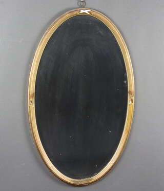 A 19th Century rectangular bevelled plate wall mirror contained in a gilt plaster ribbon frame 79cm x 47cm 