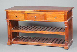 A hardwood side table fitted 3 drawers above a slatted shelf, raised on turned supports 86cm h x 149cm w x 58cm d 