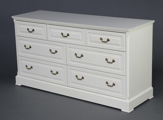 Olympus - a white laminate chest of 3 short and 4 long drawers 77cm h x 123cm w x 46cm d  