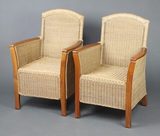 A pair of hardwood and woven cane conservatory chairs 90cm h x 63cm w  x 54cm d 