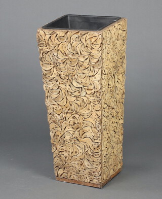 A tall metal lined planter with applied "cork" decoration 78cm h x 33cm x 33cm 
