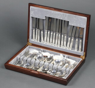 A canteen of silver plated Kings Pattern flatware contained in a mahogany finished case 
