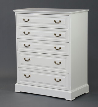 A white laminate chest of 5 drawers with brass drop handles 111cm h x 88cm w x 47cm d 