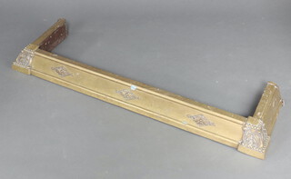 An Art Nouveau gilt metal fire curb 10cm h x 125cm w x 36cm d 
