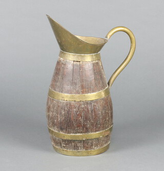 A coopered oak and brass banded jug 51cm h 