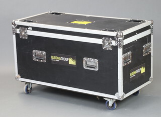 A heavy duty metal and plastic bound flight case/tour trunk on casters 74cm h x 123cm w x 60cm 