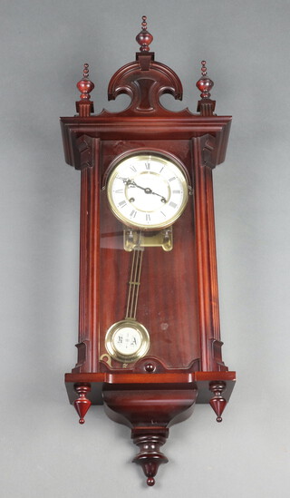 Schmeckenbecher, a German striking regulator style clock with 13cm enamelled dial contained in a mahogany case 82cm h 